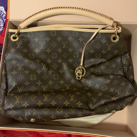 Louis Vuitton Handbags - Brown and tan Louis Vuitton bag. Never used. In dust bag, box and shopping bag.